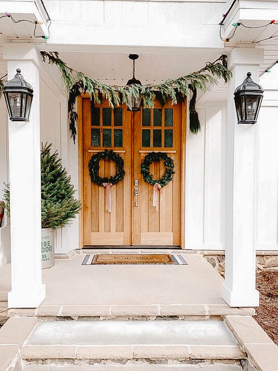 You can see a front porch decorated in a scandinavian look.