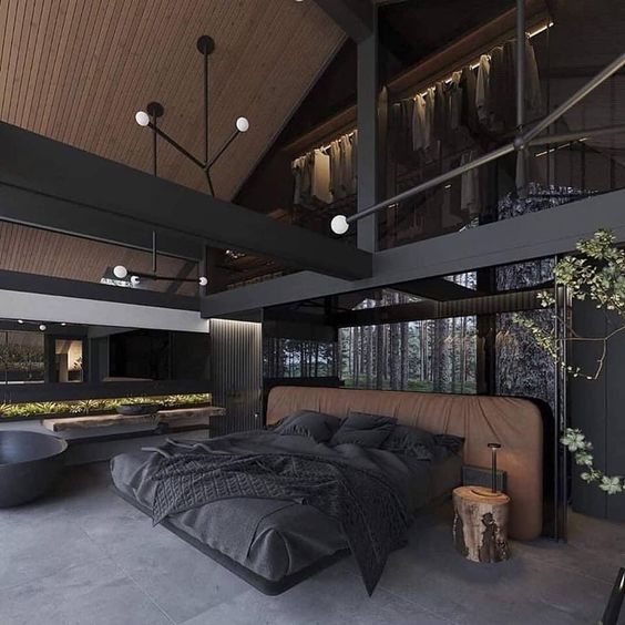 You can see a bedroom with black accents.